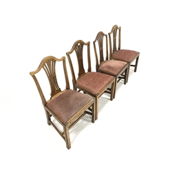 Matched set of four early 19th century oak dining chairs, pierced splats, upholstered drop in seat pads, raised on square supports, 