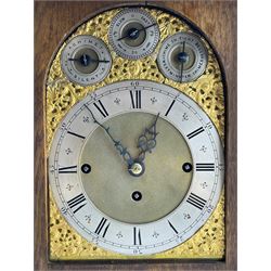 English – Edwardian oak 8-day bracket clock, three train fusee movement sounding the quarters on 8-bells and the hour on a coiled gong, flat top with egg and dart carving and carrying handle, fretted side panels and a fully glazed case door, conforming stepped plinth raised on brass feet, brass dial with foliate spandrels, serpentine hands and a silvered chapter ring, subsidiary dials for chime selection, pendulum regulation and chime/silent. With pendulum and key. 