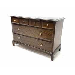 Stag Minstrel mahogany chest, fitted with four short and two long drawers, raised on shaped bracket supports