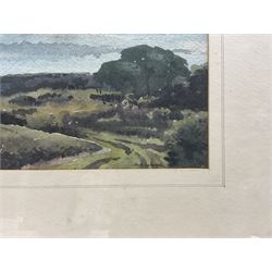 Jack Cannell (British Late 20th Century): The Path to the Sea, watercolour signed 24cm x 35cm; A Butler (British 20th Century): 'Ingleborough Hill, Yorks', oil on board signed, titled verso 14cm x 43cm (2)