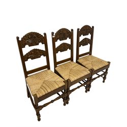 Set six Yorkshire style dining chairs, with carved cresting and back rail over rush seat, raised on turned bobbin supports 