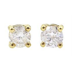 Pair of 18ct gold round brilliant cut diamond stud earrings, stamped 750, total diamond weight approx 0.65 carat