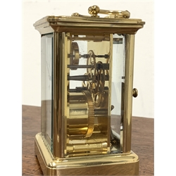 20th century brass four glass carriage clock, white enamel dial with Roman numeral chapter ring, inscribed 'Matthew Norman,' complete with key, and display box, in good working order 