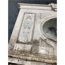 Early 20th century Georgian revival cast iron fire surround  of classical design, the over mantel with shell, acanthus leaf and fruit pediment and original oval mirror, frieze decorated with urn issuing harebell swags, with further harebells to uprights aperture 94cm x 96cm