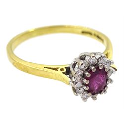 18ct gold oval ruby and round brilliant cut diamond cluster ring, 