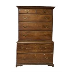 19th century oak chest on chest, the projecting cornice over two short and five long drawers, raised on bracket supports 
