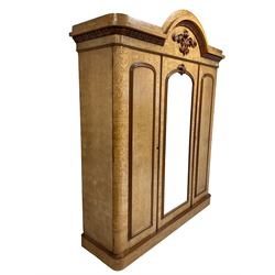 T & F Smith, Glasgow - Victorian elm triple wardrobe, the arched cornice with acanthus leaf pediment over one mirror door flanked by two doors opening to reveal interior fitted for hanging, raised on a plinth base 