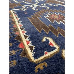 Small Hammadan hand-made  ground rug, the blue field decorated with geometric design 107cm x 200cm