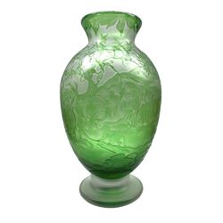 Large modern Cameo style green glass vase, decorated with Tigers, Monkeys, Parrots, Antelope and other animals in a tropical jungle setting, unsigned, H37cm  