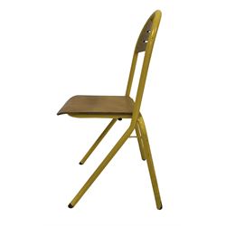 Set 8 mid-20th century French stacking school chairs, yellow painted frame with wood back and seat