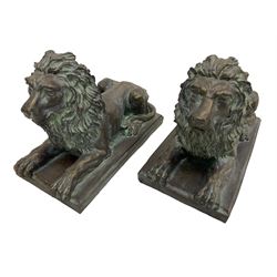 Pair bronze finish cast stone recumbent lions, on rectangular plinth base