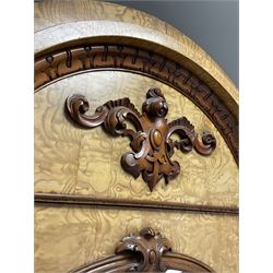 T & F Smith, Glasgow - Victorian elm triple wardrobe, the arched cornice with acanthus leaf pediment over one mirror door flanked by two doors opening to reveal interior fitted for hanging, raised on a plinth base 
