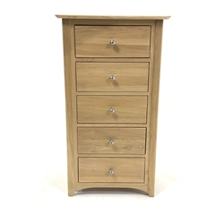 Contemporary solid oak double wardrobe, with panelled doors enclosing interior fitted for hanging, ( W110cm, H193cm, D58cm) together with a matching tall boy fitted with five short drawers, (57cm, H107cm, D42cm)