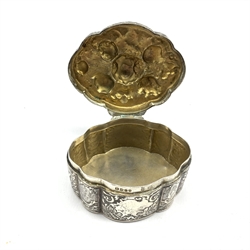 Silver circular dressing table box with pull off tortoiseshell cover and silver pique decoration D8.5cm Birmingham 1931, a similar smaller box with hinged cover and a 19th century continental silver oval box and cover with embossed decoration, import marks Chester 1899 (3)