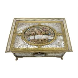 Early 19th century French Palais Royal type ormolu and mother-of-pearl musical sewing etui, the hinged cover and sides with foliate engraved mother of pearl panels and applied gilt glass domes inset with dried flowers, pierced ormolu gallery and embossed mounts, set on four acanthus and hoof feet, the velvet lined interior with 18ct gold and gold mounted utensils including thimble, pair of scissors, needle case, spike, cut glass scent bottle and bodkin mostly marked with Paris ram’s head hallmark, mother of pearl snowflake winders, two bobbins and floral embroidered pin cushion, with later two air musical movement beneath, L18cm, H9cm, D13cm Provenance: With a handwritten letter gifting the box to her niece and explaining some of it's history, dated 1908