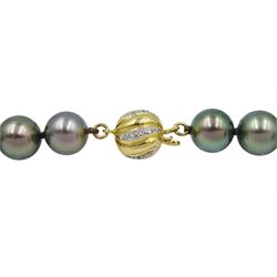 Single strand graduating Tahitian pearl necklace, with 18ct gold diamond ball clasp, stamped 18K 750, retailed by Rosendorff, Australia with original receipt