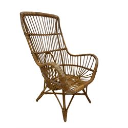 Vintage bamboo armchair, with woven arm rests, raised on splayed supports united by 'x' stretcher W64cm