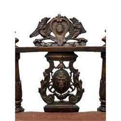 19th century walnut settee, cartouche pediment carved with two eagles, shaped double-ended top rail carved with acanthus leaves and masks, supported by four shaped splats, the central splat carved with acanthus scrolls and lion mask, upholstered drop in seat cushion, the shaped aprons carved with scrolling foliage, turned and fluted supports