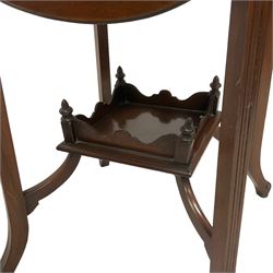 Edwardian walnut occasional table, four drop leaves, on moulded supports joined by galleried under-tier
