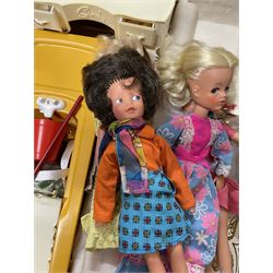 Pedigree Sindy Home set (unchecked for completeness), three Sindy dolls marked 'made in Hong Kong', another marked 'made in England', Sindy wardrobe with clothes, dressing table and other accessories