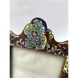 19th century French Champleve enamel mirror of serpentine outline with foliate scroll  decoration, 32cm x 22cm 