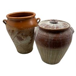 Terracotta twin handled urn with lid, used as a salt storage jar from Bar Convent York, together with another max H39cm