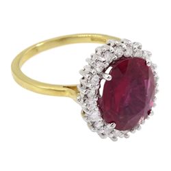 18ct gold oval cut Thai ruby and round brilliant cut diamond cluster ring, hallmarked, ruby approx 4.35 carat