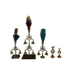 Various horse brasses including inverted crescents, hearts, animals, Diamond 1897 Jubilee and other accessories including a hame plate, terrets on stands, rope etc, together with 'All About Horse Brasses' by H.S. Richards 