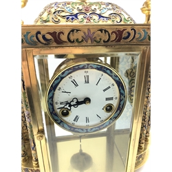 Brass and cloisonne decorated mantel clock, circular Roman and Arabic dial enclosed by bevel glazed door, with eight column and urn finial, twin train movement striking the hours and half on single coil, with pendulum, W36cm, H46cm