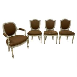 Set of four (3+1) Louis XVI design polychrome hardwood dining chairs, moulded shield back carved with trailing ribbon, upholstered seat and back, on turned and fluted supports carved with laurel leaves, the carver with heart-shaped back over upholstered arms with acanthus scrolled terminals 