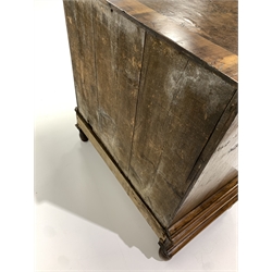Early 18th century and later Queen Anne burr walnut and oak crossbanded chest on stand, the top section fitted with two short and three long graduated drawers, one long drawer under, raised on turned supports