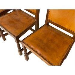 Lizardman - set six oak dining chairs, carved lattice panel to back, tan leather seat and back with stud bands, on octagonal supports joined by plain stretchers, craved with lizard signature, four side chairs and two carvers, by Derek Slater of Crayke
