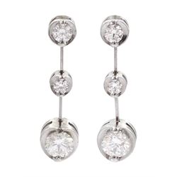 Pair of 18ct white gold graduating three stone round brilliant cut diamond pendant earrings, total diamond weight approx 0.55 carat