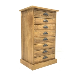 20th century light oak filing chest, fitted with eight drawers, raised on plinth base, W55cm, H94cm, D41cm