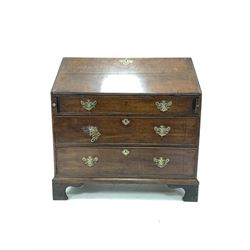 19th century oak bureau, the cross banded fall front revealing interior fitted with drawers and cubby holes, over three long graduating drawers, raised on shaped bracket feet, W97cm, H101cm, D52cm