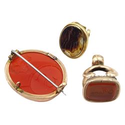 Victorian gold carnelian intaglio seal brooch, the reverse with engraved wheatsheaf and initial 'S', stamped 9ct, gold agate seal fob, depicting Roman soldiers and one other 'Maria' seal fob