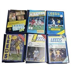 Leeds United football club - over three-hundred home game programmes including, 1974/75, 1975/76, 1976/77, 1978/79, 1980/81 etc, all housed in blue folders