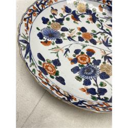 Kangxi Chinese porcelain blue and white  'Lotus' plate D22cm, Chinese scalloped bowl decorated in the Imari palette, both bearing a ribbon bound lozenge mark, together with an 18th century Chinese porcelain plate (3)