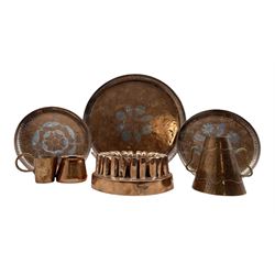 Victorian copper jelly mould by Benham and Froud D17cm, three copper trays with pewter inlay largest D27cm and three other copper items