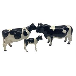 Beswick Friesian family comprising Coddington Hilt Bar bull, Claybury Leegwater cow and calf Nos. 1439a, 1362a and 1249c (3)