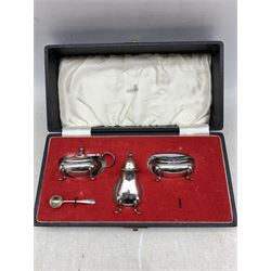 Set of twelve silver coffee spoons and tongs with shell finials Sheffield 1921 Maker Cooper Bros, cased, set of six silver coffee spoons and a silver three piece condiment set 9oz