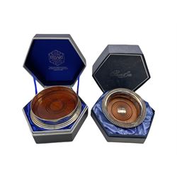 Stuart crystal silver-plated and mahogany bottle coaster and another by Barker Ellis, both in original presentation boxes (2)
