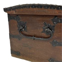19th century oak and metal bound chest, dome hinged top with metal strapping, the interior with small hinged compartment, fitted with wrought iron carrying handles