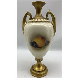 Early 20th century Royal Worcester vase by William Ricketts, of slightly lobed ovoid form with twin acanthus and scroll mounted handles, hand painted with a still life of fruit against a mossy ground, signed Ricketts, upon a gilt circular moulded foot, with puce printed marks beneath including shape number H313, and indistinct date code, probably 1925, H29.5cm