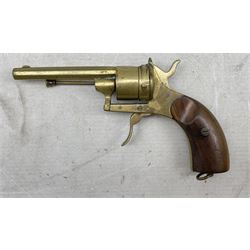 Novelty brass cigar cutter in the form of a revolver pistol with walnut grip, L17cm