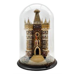 Edwardian velvet and beadwork model of a Church tower dated 1910, set with three dials and arched mirrored windows and doors, housed under a circular glass dome on ebonised base, H67cm overall