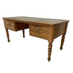 19th century pine kneehole writing desk, the rectangular top with inset green leather surface, fitted with three drawers, on turned supports