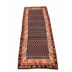 Large kilim ground carpet, the blue field with repeating geometric motif, enclosed by three borders 484cm x 197cm