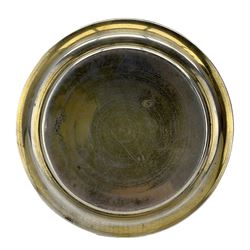 19th century Russian silver-gilt niello dish, of circular form, centrally decorated with a circular cartouche depicting a town scene, against a floral and cross-hatched ground, assay marks for Moscow, Viktor Savinkov, 84 zolotniki mark, D11cm
