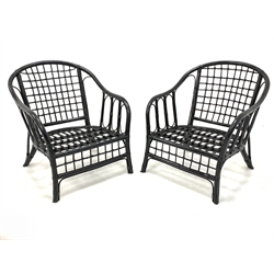 Pair of mid century black painted bamboo conservatory chairs, with lattice back and seat panel and open arms